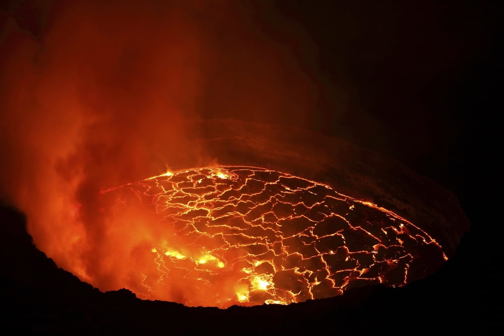 Lava lake in pit crater Nyiragongo Volcano Democratic Republic of Congo Canvas Art - Richard RoscoeStocktrek Images (18 x 12)