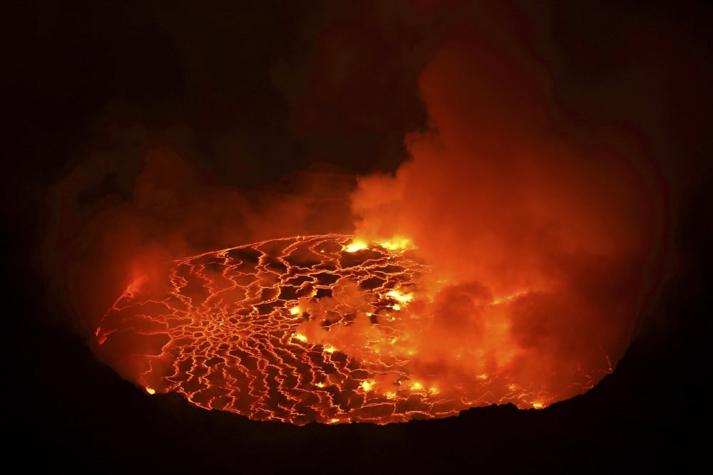 Lava lake in pit crater Nyiragongo Volcano Democratic Republic of Congo Canvas Art - Richard RoscoeStocktrek Images (18 x 12)