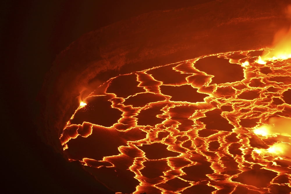 Lava lake in summit caldera Nyiragongo Volcano Democratic Republic of the Congo Canvas Art - Richard RoscoeStocktrek Images (35 x 23)