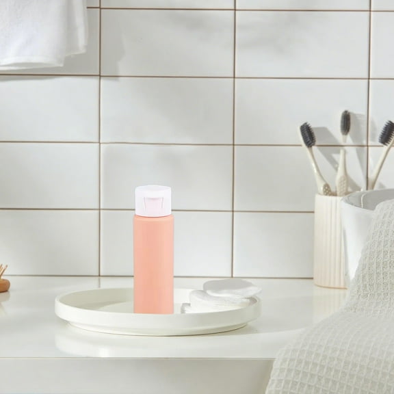 Leakproof 50ml Refillable Travel Bottles with Flip-Top Caps for Toiletries and Cosmetics