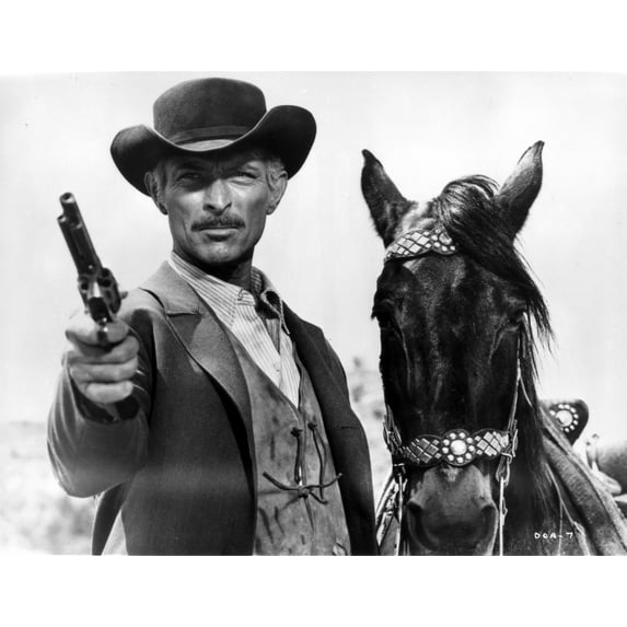 Lee Van Cleef with a revolver and horse Photo Print (8 x 10)
