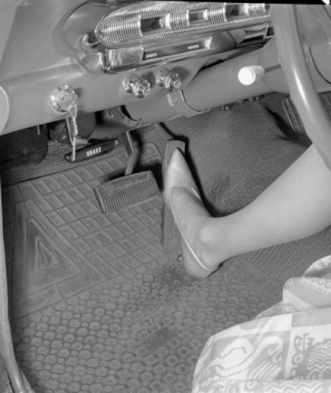 Leg of woman stepping on accelerator Canvas Art - (18 x 24)