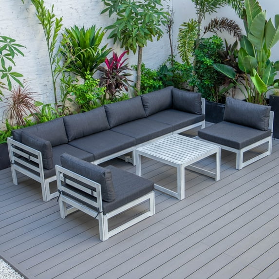 LeisureMod Chelsea 7-Piece Outdoor Patio Conversation Set in Weathered Grey Aluminum with Coffee Table & Cushions In Black