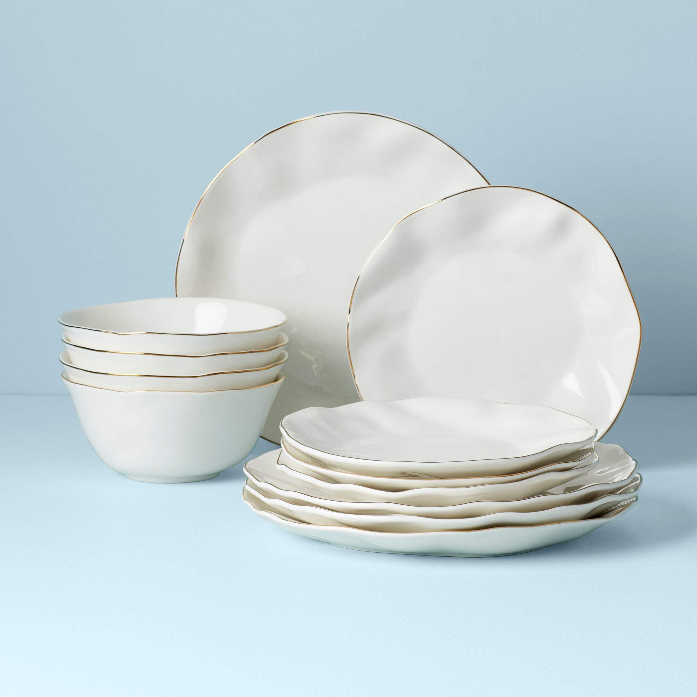 White and Blue Porcelain 12-Piece Dinnerware Set with Gold Rim