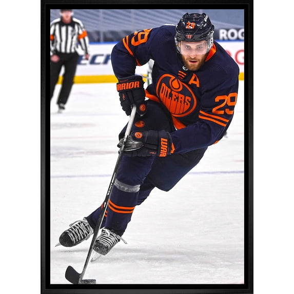 Leon Draisaitl Edmonton Oilers Framed 20x29 Skating with Puck Canvas