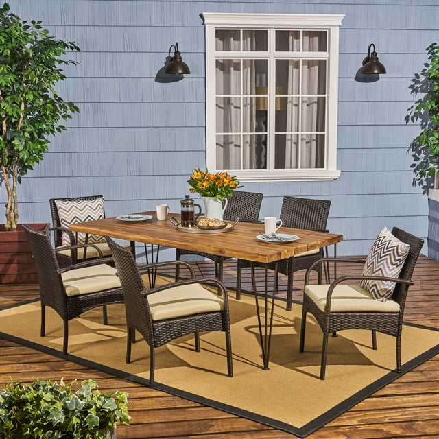 Leon Outdoor 72 Inch 7 Piece Acacia Wood Dining Set with Iron Table Legs and Wicker Chairs with Cushions, Teak, Rustic Metal, Multi-Brown, Cream