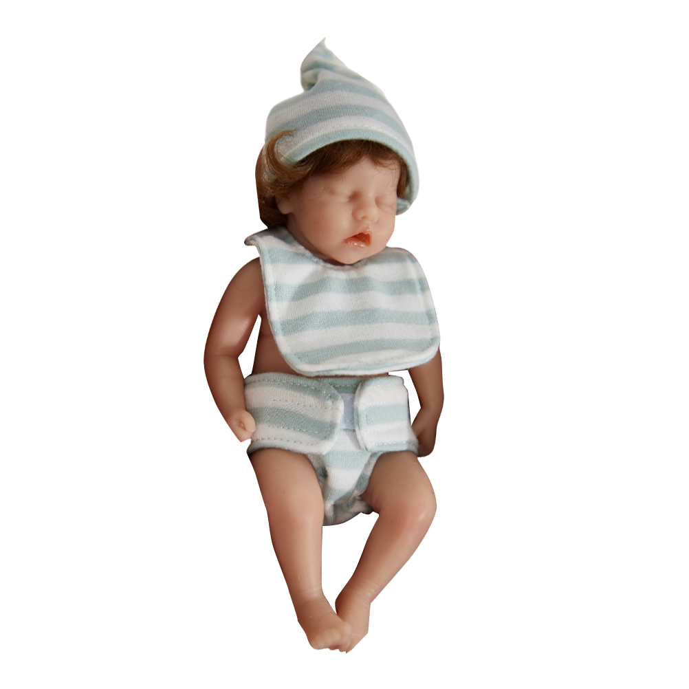 Mini authentic 6 inch silicone reborn baby doll.