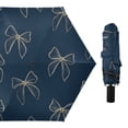thumbnail image 1 of Light Yellow Bows Blue Background All Weather Umbrella Triple Folding Parasol 6 Ribs UV Protection Portable, 1 of 8