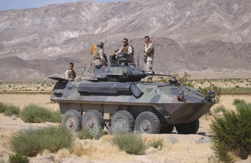 Light armored vehicle crewmen take a break under the high desert sun Canvas Art - Stocktrek Images (34 x 22)
