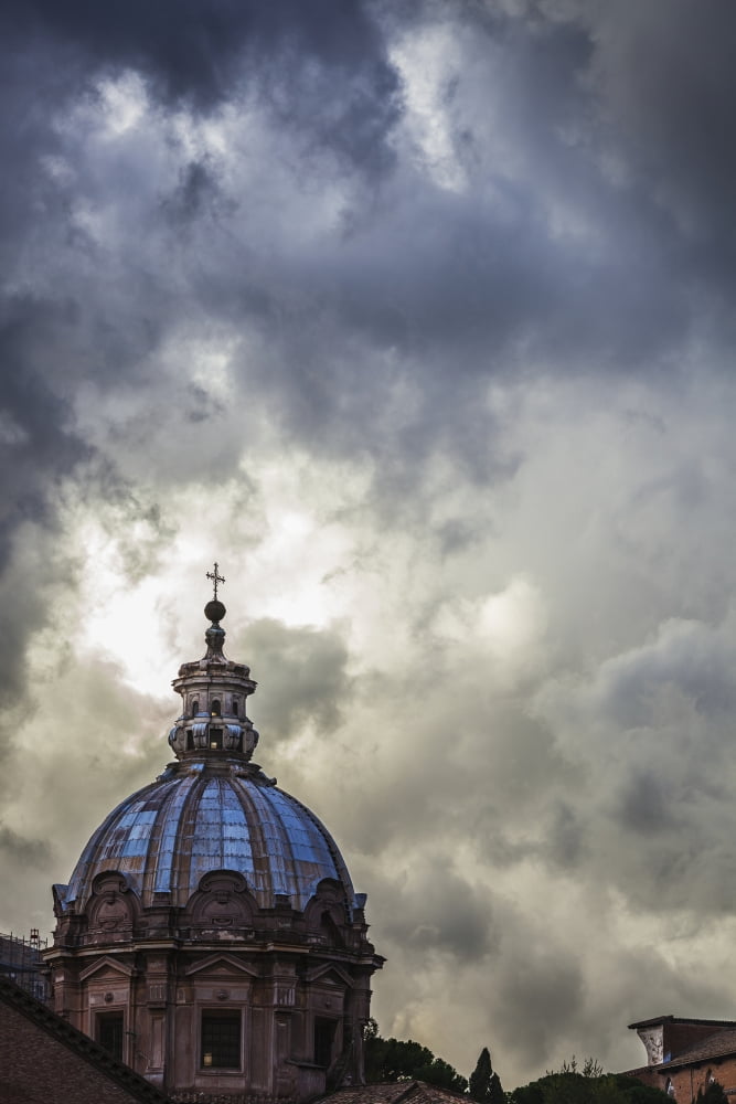 Light breaks through the turbulent clouds on the dome of the Santi Luca e Martina church Rome Italy Canvas Art - Reynold Mainse Design Pics (12 x 19)
