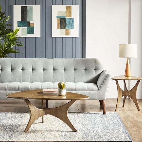 Light brown triangle coffee table with elm finish for a cozy living room