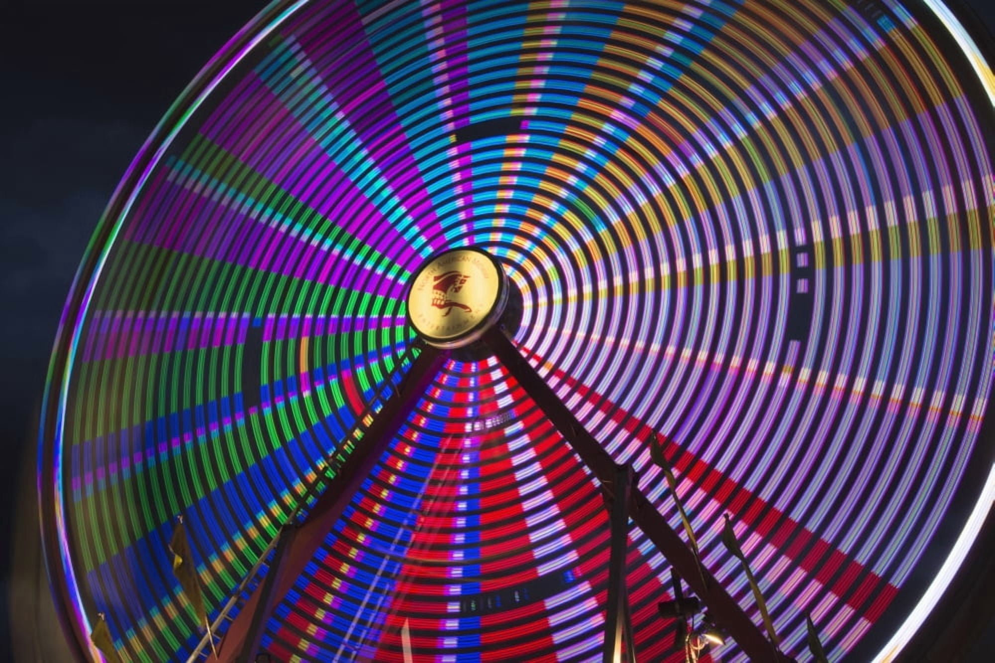 Light effect of a fairground ride at night at the Calgary Stampede Calgary Alberta Canada Canvas Art - Philippe Widling Design Pics (38 x 24)