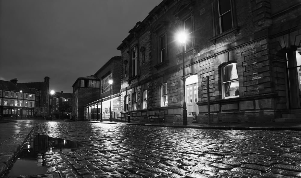 Light from a lamp post illuminating wet cobblestone road South Shields Tyne and Wear England Canvas Art - John Short  Design Pics (40 x 22)