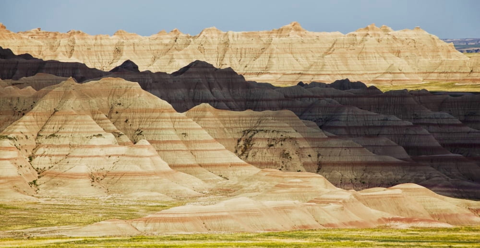 Light and shadows paint the landscape of badlands national park south dakota united states of america Canvas Art - Robert Postma Design Pics (21 x 11)