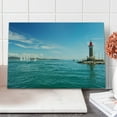 thumbnail image 1 of Lighthouse Cutting Board, Day by the Seaside Sailboats Lighthouse Rocks Clear Sea Clouds Island Seascape, Decorative Tempered Glass Cutting and Serving Board, Large Size, Multicolor, by Ambesonne, 1 of 5