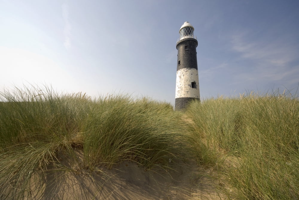 Lighthouse In The Dunes Canvas Art - John Short Design Pics (36 x 24)