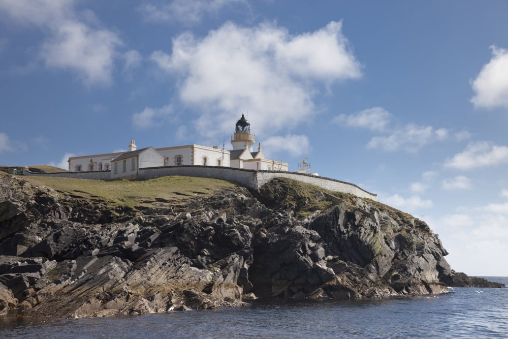 Lighthouse On Cliff Bressay Scotland Canvas Art - John Short Design Pics (38 x 24)