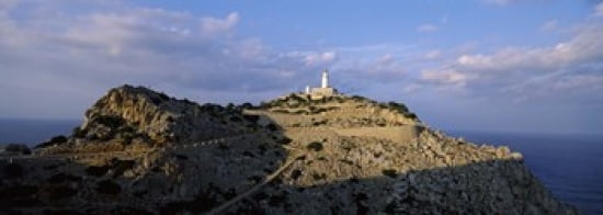 Lighthouse at a seaside Majorca Spain Canvas Art - Panoramic Images (36 x 13)