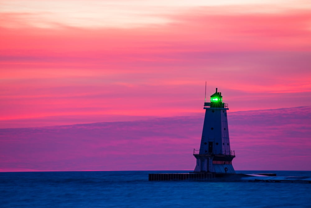Lighthouse on the coast at dusk Ludington North Pierhead Lighthouse Lake Michigan Ludington Mason County Michigan USA Canvas Art - Panoramic Images (24 x 36)