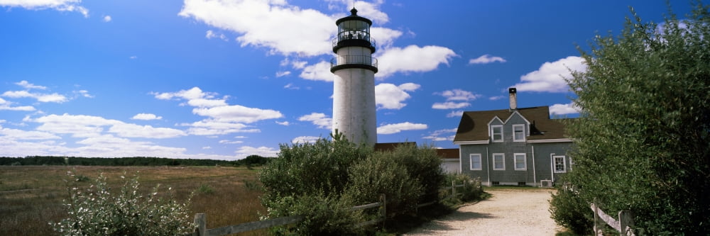 Lighthouse in the field Highland Light Cape Cod National Seashore North Truro Cape Cod Barnstable County Massachusetts USA Canvas Art - Panoramic Images (12 x 36)