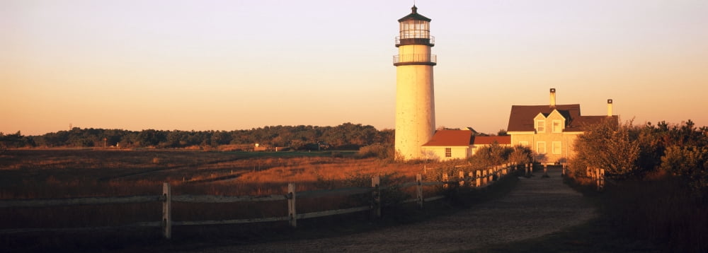 Lighthouse in the field Highland Light Cape Cod National Seashore North Truro Cape Cod Barnstable County Massachusetts USA Canvas Art - Panoramic Images (7 x 18)