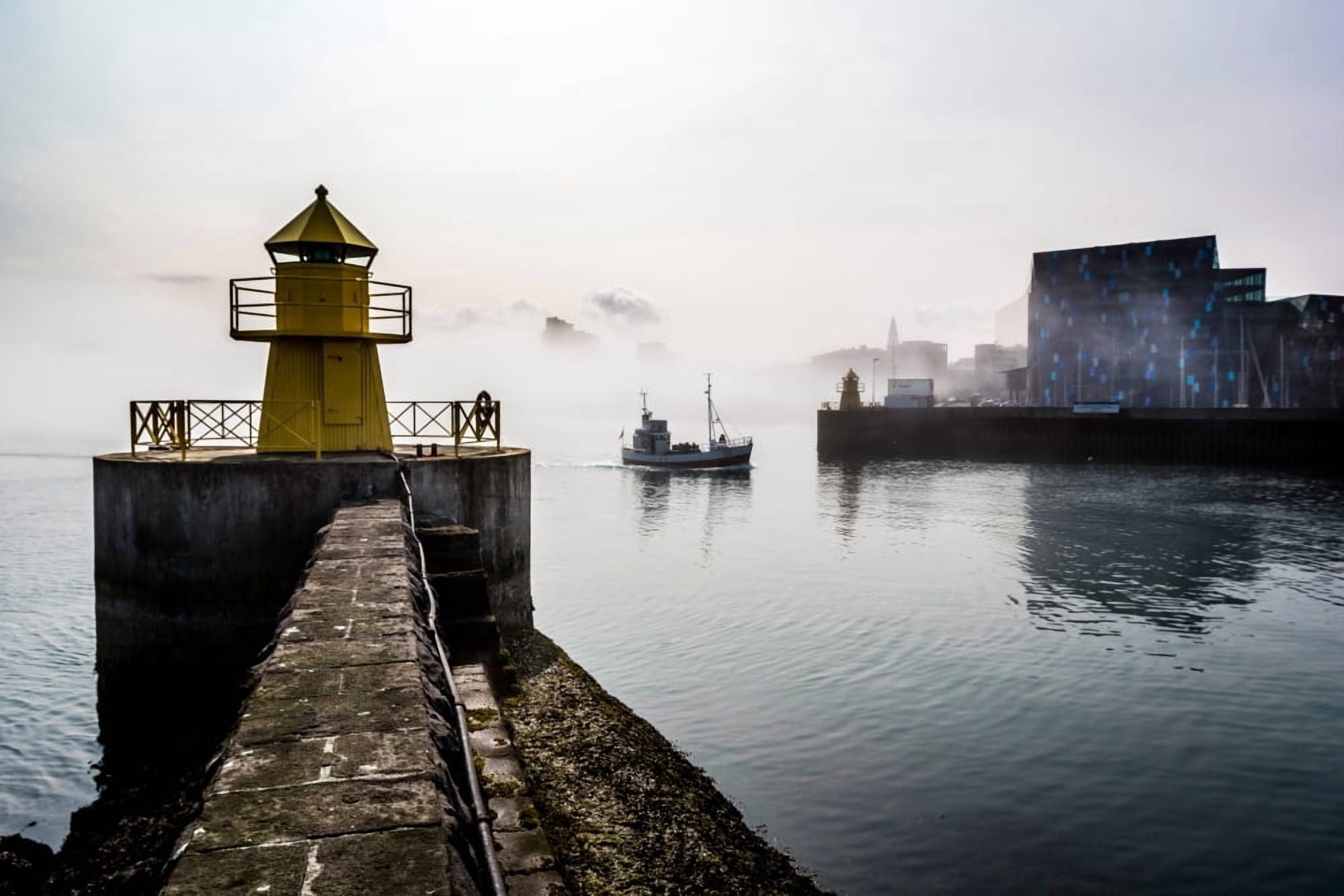 Lighthouse in Reykjavik Harbor Harpa in background Reykjavik Harbor Iceland Canvas Art - Panoramic Images (36 x 12)