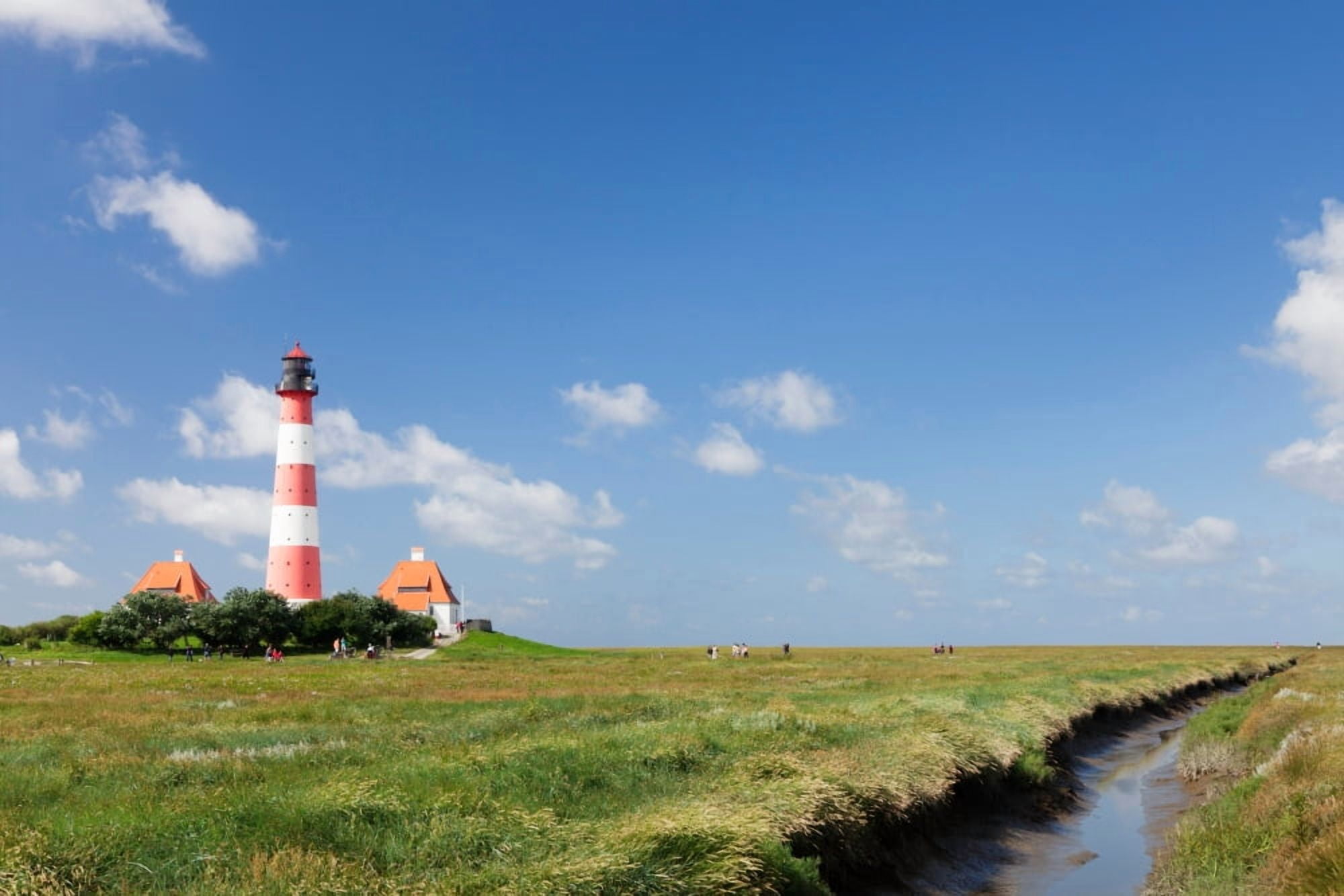 Lighthouse in a farm Westerheversand Lighthouse Westerhever Eiderstedt Schleswig-Holstein Germany Canvas Art - Panoramic Images (27 x 9)