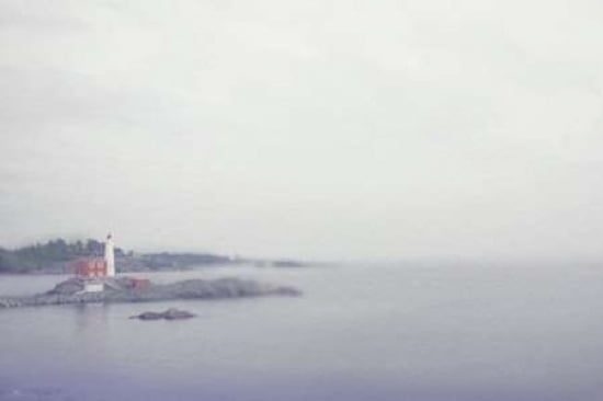 Lighthouse in the Sea Canvas Art - Roberta Murray (24 x 36)