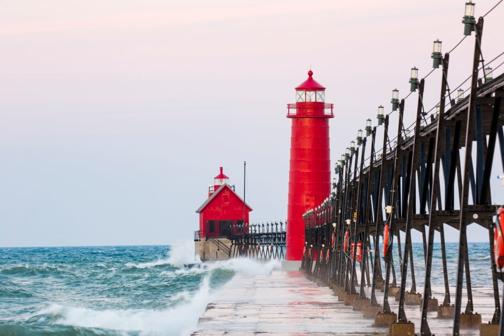 Lighthouse on the jetty at sunrise Grand Haven South Pierhead Inner Lighthouse Lake Michigan Grand Haven Ottawa County Michigan USA Canvas Art - Panoramic Images (24 x 36)