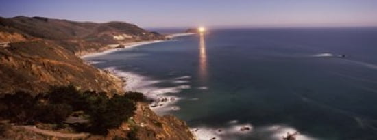 Lighthouse lit up at night moonlight exposure Big Sur California USA Canvas Art - Panoramic Images (30 x 12)