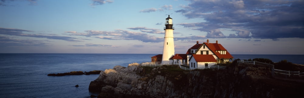 Lighthouse on a cliff Portland Head Lighthouse Cape Elizabeth Cumberland County Maine USA Canvas Art - Panoramic Images (27 x 9)