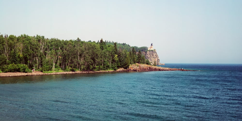 Lighthouse on a cliff Split Rock Lighthouse Lake Superior Minnesota USA Canvas Art - Panoramic Images (12 x 24)