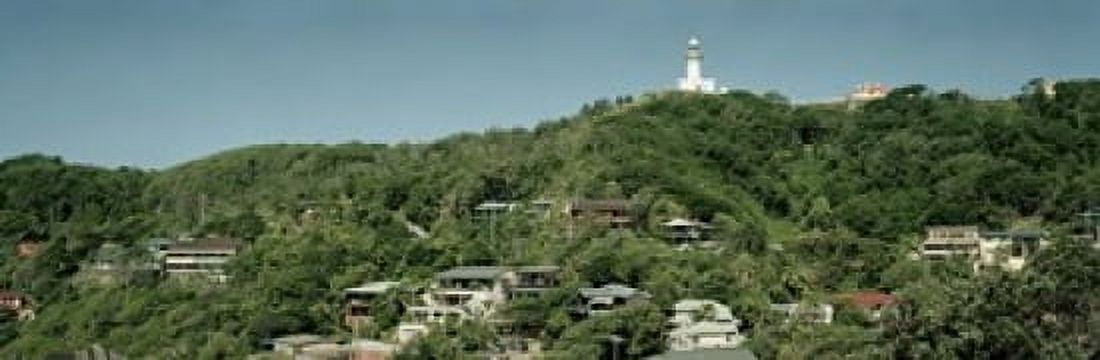 Lighthouse on a hill Canvas Art - Panoramic Images (18 x 6)
