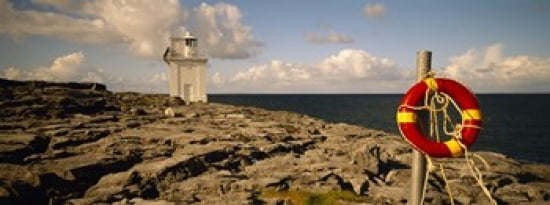 Lighthouse on a landscape Blackhead Lighthouse The Burren County Clare Republic Of Ireland Canvas Art - Panoramic Images (30 x 12)