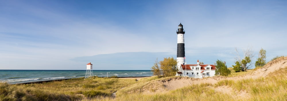 Lighthouse on the coast Big Sable Point Lighthouse Lake Michigan Ludington Mason County Michigan USA Canvas Art - Panoramic Images (13 x 36)