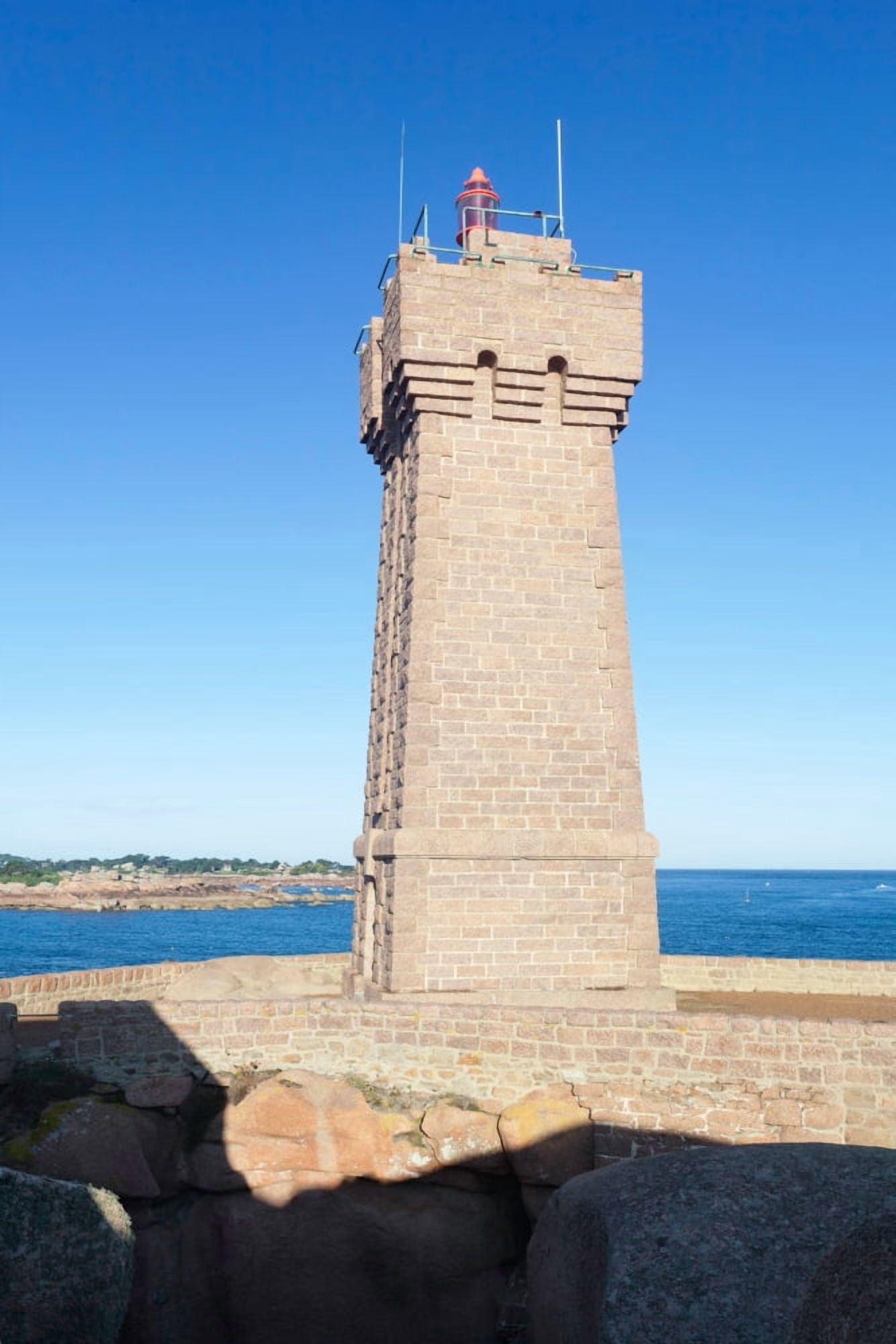 Lighthouse on the coast Leuchtturm Von Meen Ruz Ploumanach Cote De Granit Rose Cotes-dArmor Brittany France Canvas Art - Panoramic Images (27 x 9)