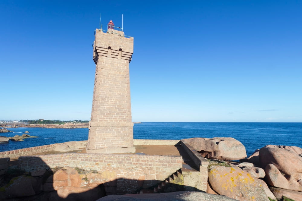 Lighthouse on the coast Leuchtturm Von Meen Ruz Ploumanach Cote De Granit Rose Cotes-dArmor Brittany France Canvas Art - Panoramic Images (27 x 9)
