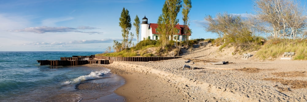 Lighthouse on the coast Point Betsie Lighthouse Lake Michigan Benzie County Frankfort Michigan USA Canvas Art - Panoramic Images (12 x 36)