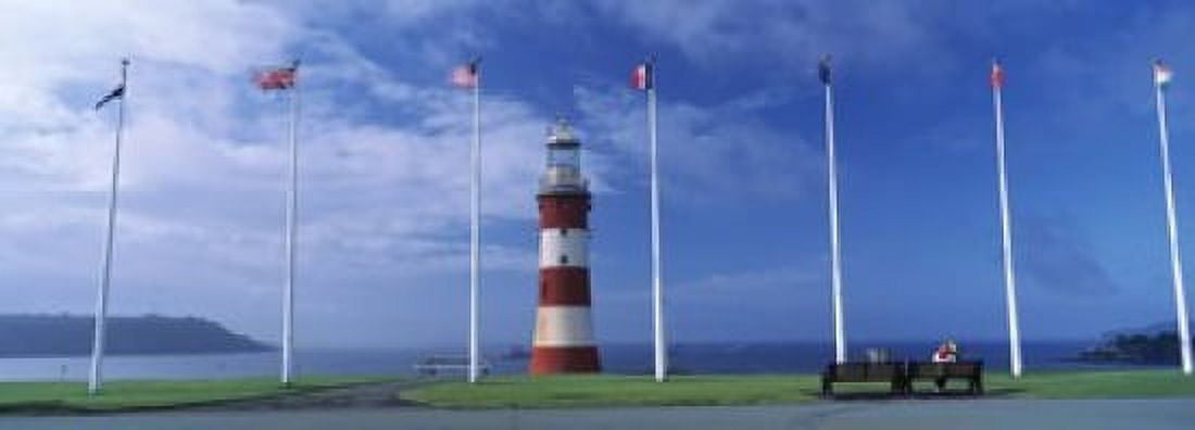 Lighthouse with flags on the coast Smeatons Tower Plymouth Hoe Plymouth Devon England Canvas Art - Panoramic Images (18 x 7)