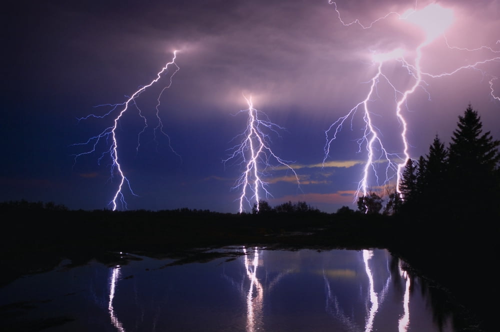 Lightning Storm Over A Lake Canvas Art - Corey Hochachka Design Pics (17 x 11)
