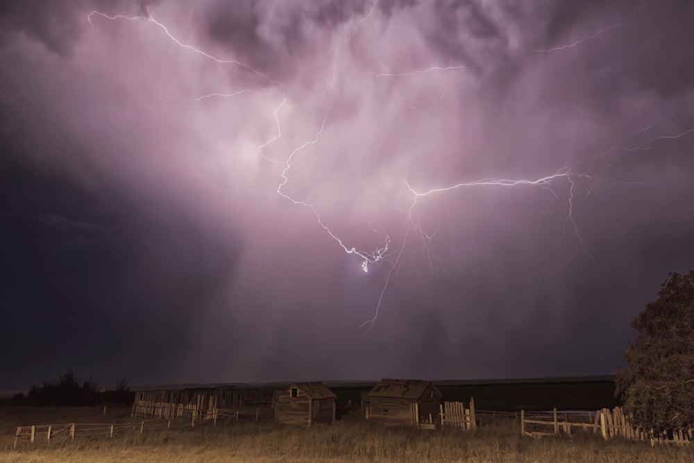 Lightning bolt over some abandoned buildings near val marieSaskatchewan canada Canvas Art - Robert Postma Design Pics (19 x 12)