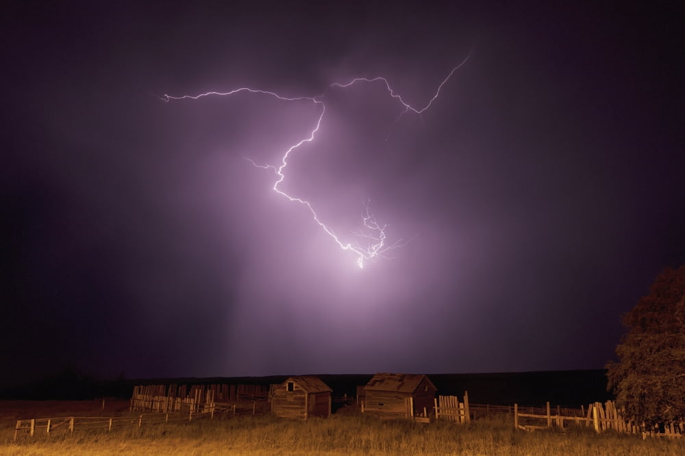 Lightning bolt over some abandoned buildings near val marieSaskatchewan canada Canvas Art - Robert Postma Design Pics (19 x 12)