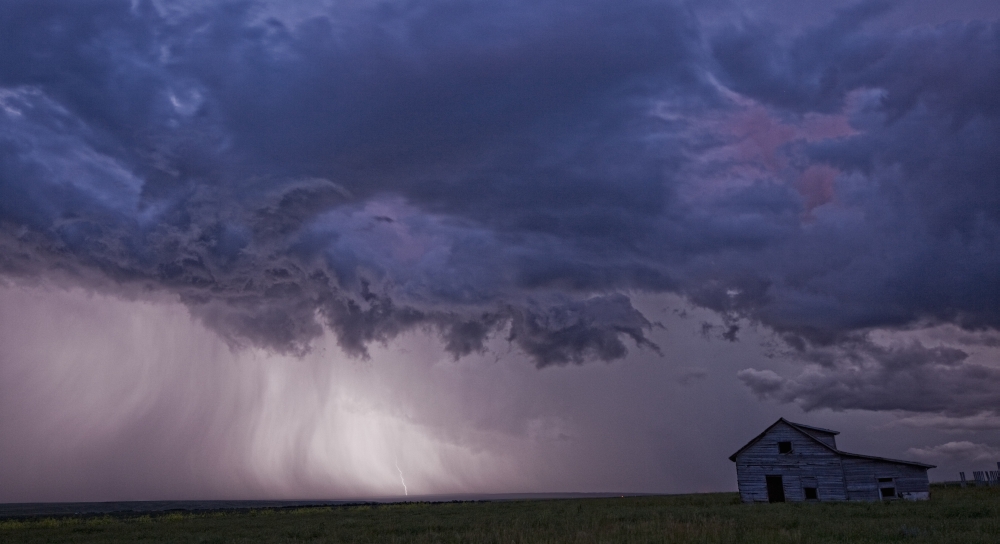 Lightning strikes over the prairies as it approaches an old abandoned farm house Val Marie Saskatchewan Canada Canvas Art - Robert Postma Design Pics (18 x 10)