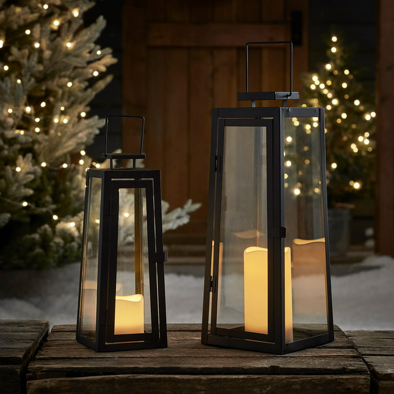 https://i5.walmartimages.com/seo/Lights4fun-Inc-Set-of-Two-Black-Metal-Battery-Operated-LED-Indoor-Outdoor-Garden-Patio-Flameless-Candle-Lantern-Lights_83511ed0-191b-4973-aa87-4c5702715723.aa3abbdb569f88b2a9dccd1f58004020.jpeg?odnHeight=768&odnWidth=768&odnBg=FFFFFF