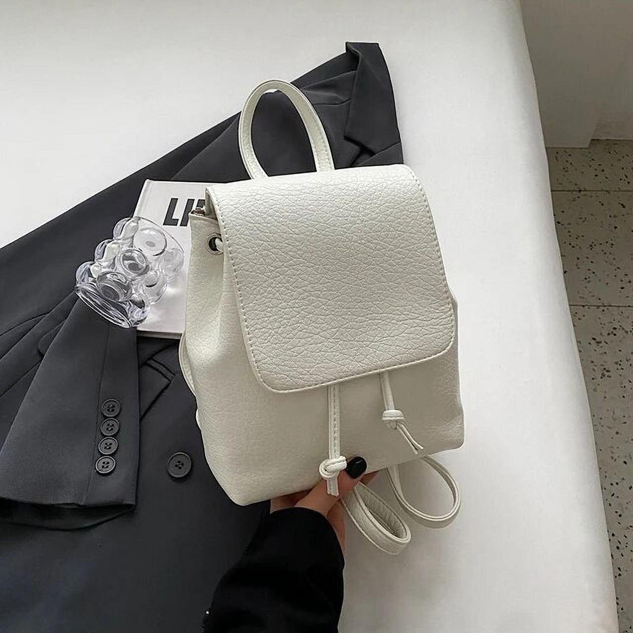 Luxury mini backpack best sale