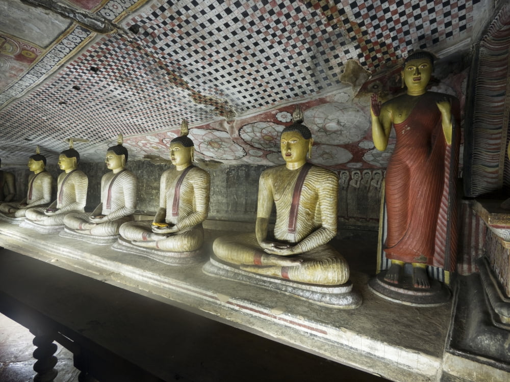 Line of Buddha statues in Cave II of Dambulla Cave Temple (1st century BCE) Dambulla Central Province Sri Lanka Canvas Art - Panoramic Images (12 x 16)