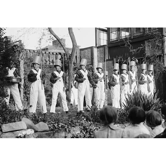 Line of Boys pose as Soldiers with inverted pails on their heads Poster Print (18 x 24)