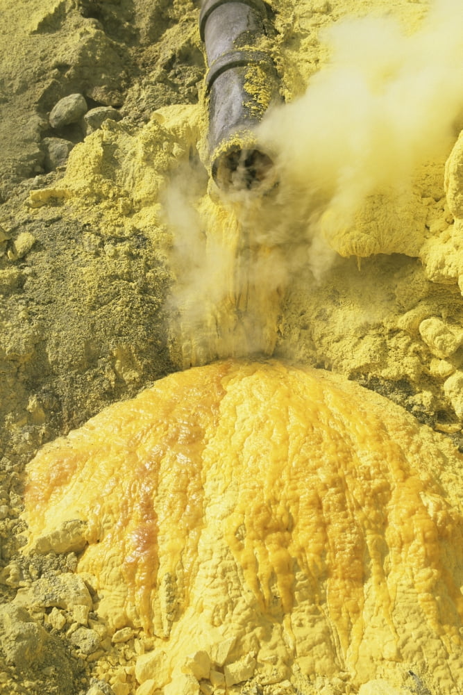 Liquid sulphur running out of a pipe in Kawah Ijen Volcano Sulphur Mine Java Indonesia Canvas Art - Richard RoscoeStocktrek Images (12 x 18)