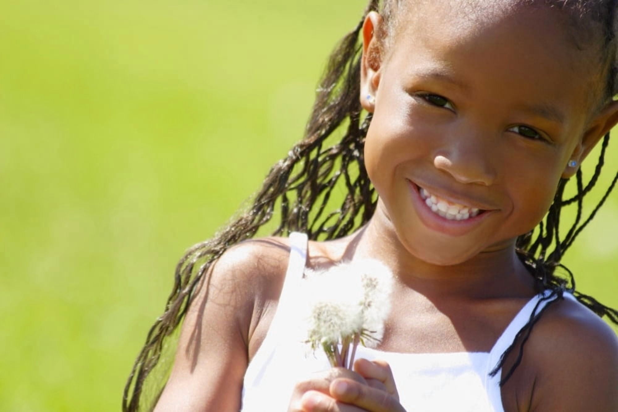 Little Girl Holding Weeds Canvas Art - Hanson Ng Design Pics (34 x 22)