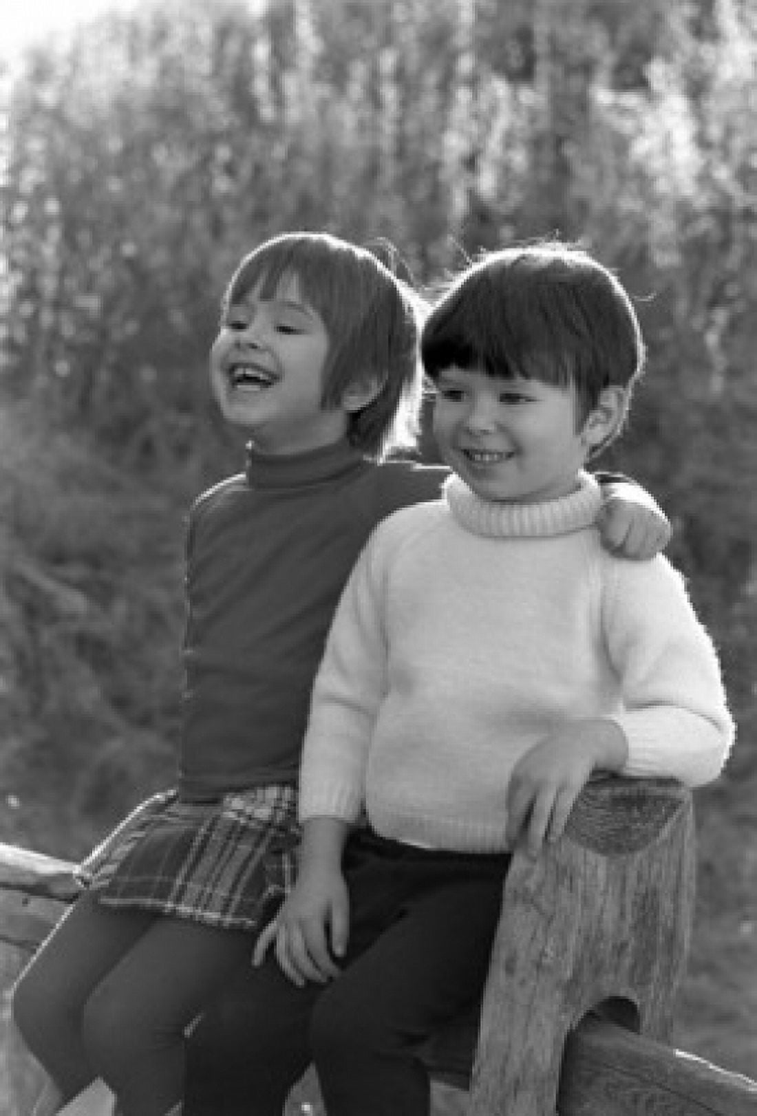 Little boy and girl sitting on a rail fence Canvas Art - (18 x 24)